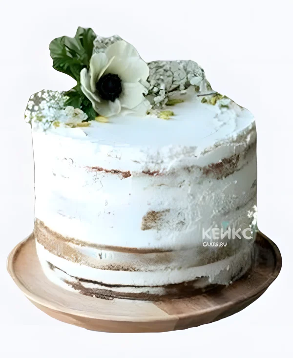 Маленький свадебный торт открытый с белым цветком Фото