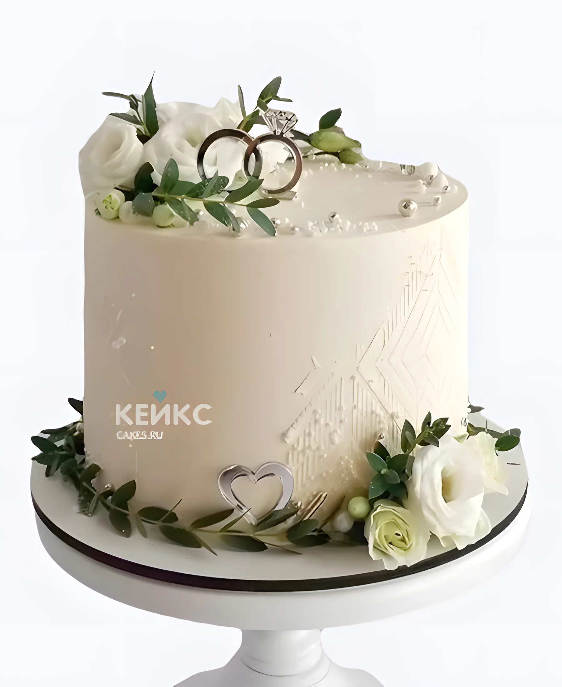 Маленький свадебный торт с фигурками колец Фото