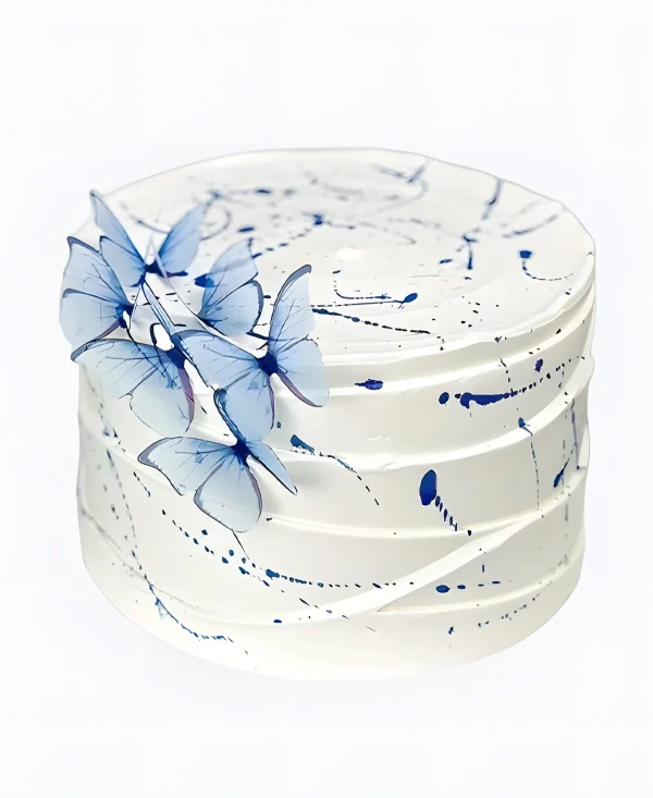 Рифленый торт с голубыми бабочками Фото