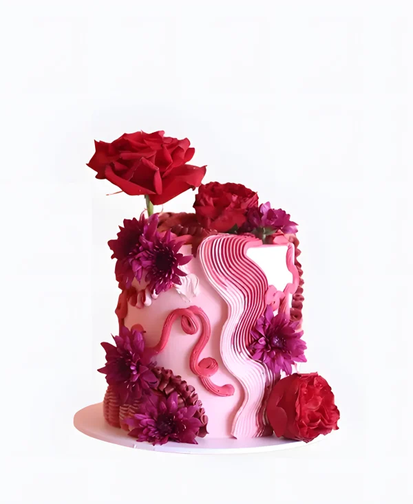 Розовый трендовый торт на свадьбу с яркими цветами Фото