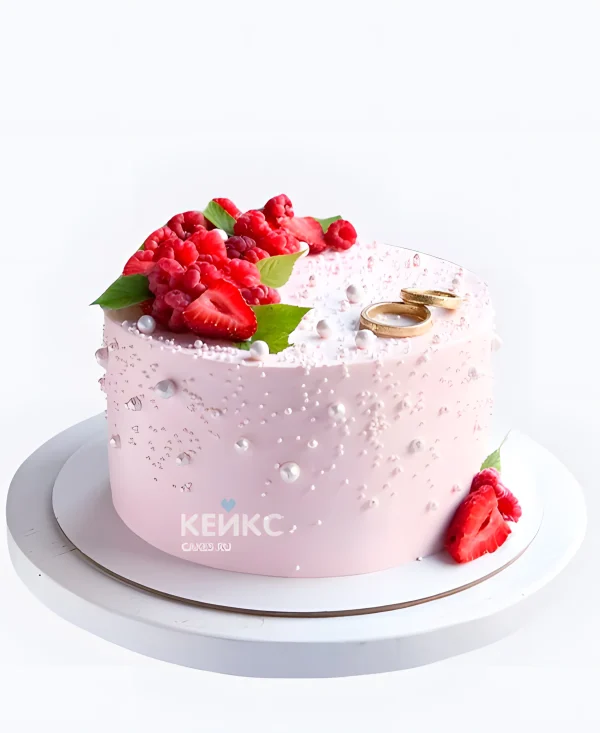 Свадебный торт с кольцами и ягодами Фото