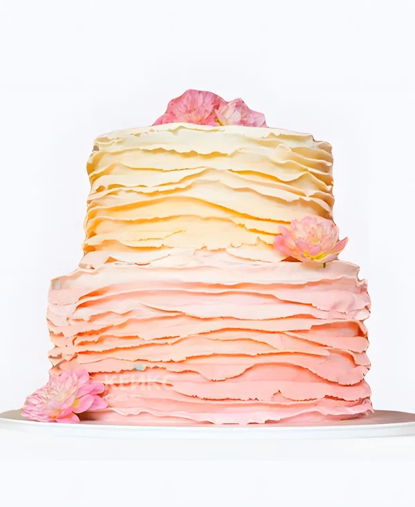 Свадебный торт в стиле Омбре желто-персиковый с цветами Фото