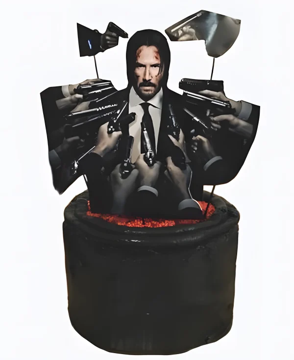 Торт черный Джон Уик в окружении пушек Фото