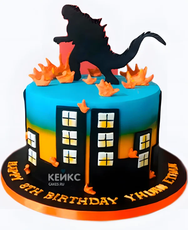 Торт Годзилла в огне над городом Фото