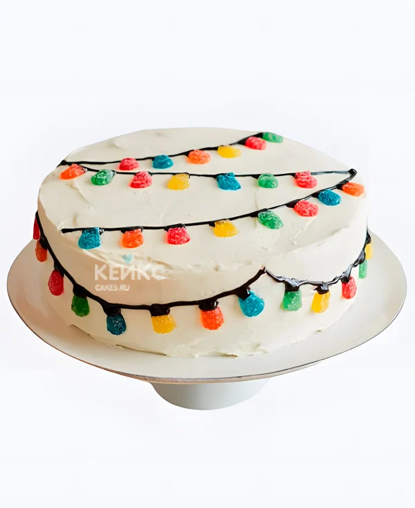 Торт на Рождество с гирляндой Фото