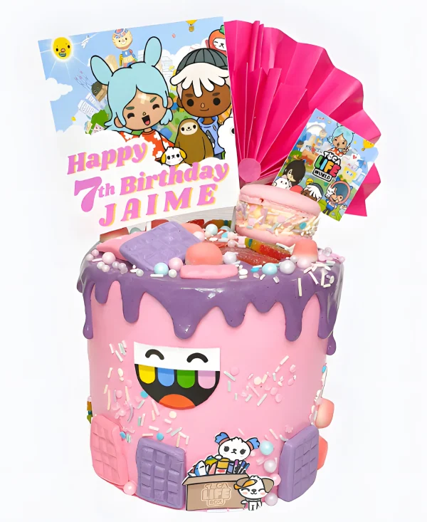 Торт розовый со сладостями и веером Фото