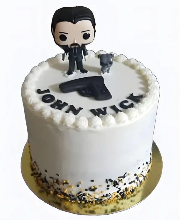 Торт с фигуркой мультяшного Джона Уика и пистолетом Фото