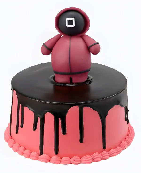 Торт с фигуркой в шоколадных подтеках Фото