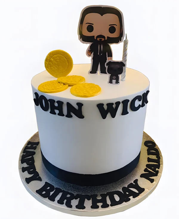 Торт с мультяшным Джоном Уиком и монетками Фото