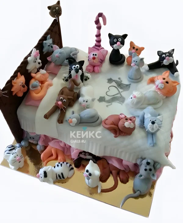 Торт в виде кровати с котиками Фото