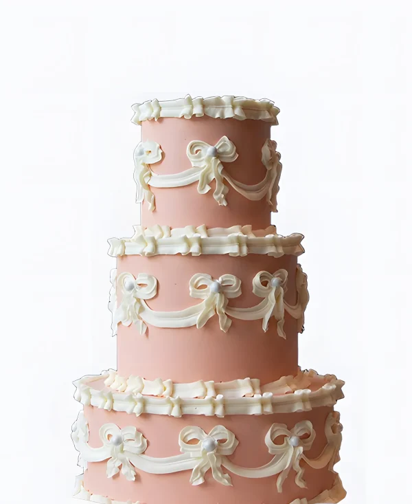 Трендовый торт на свадьбу с кремовыми бантиками Фото