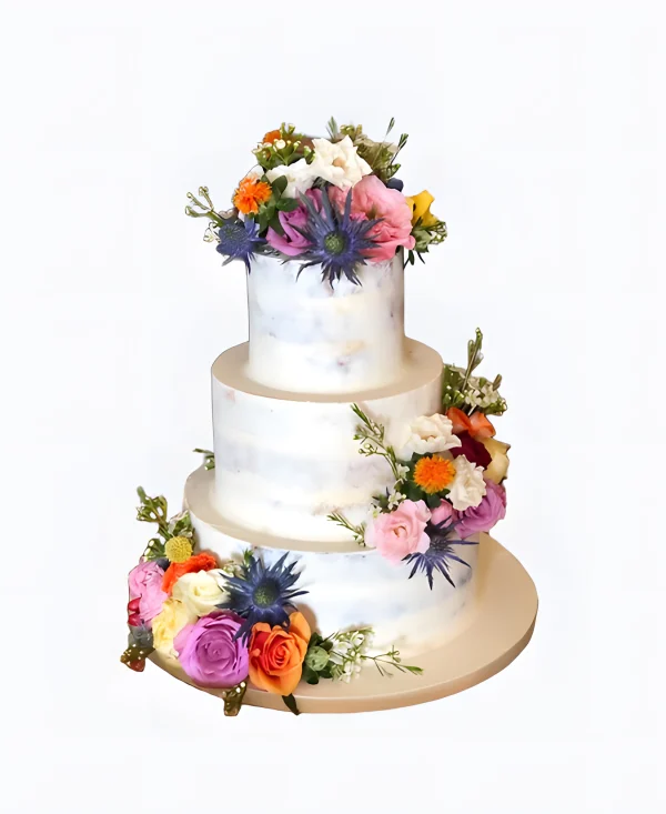Трендовый торт на свадьбу с яркой цветочной композицией Фото