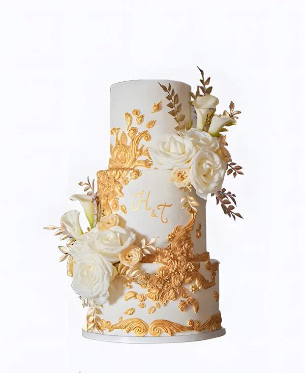 Трендовый торт на свадьбу с золотыми вензелями Фото