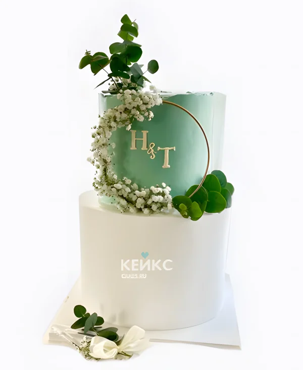 Зеленый свадебный торт с инициалами и аркой Фото