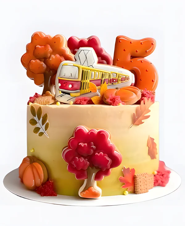 Оранжевый торт с трамваем Фото