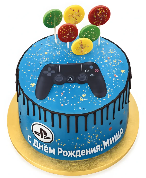 Голубой торт с леденцами и джойстиком Фото