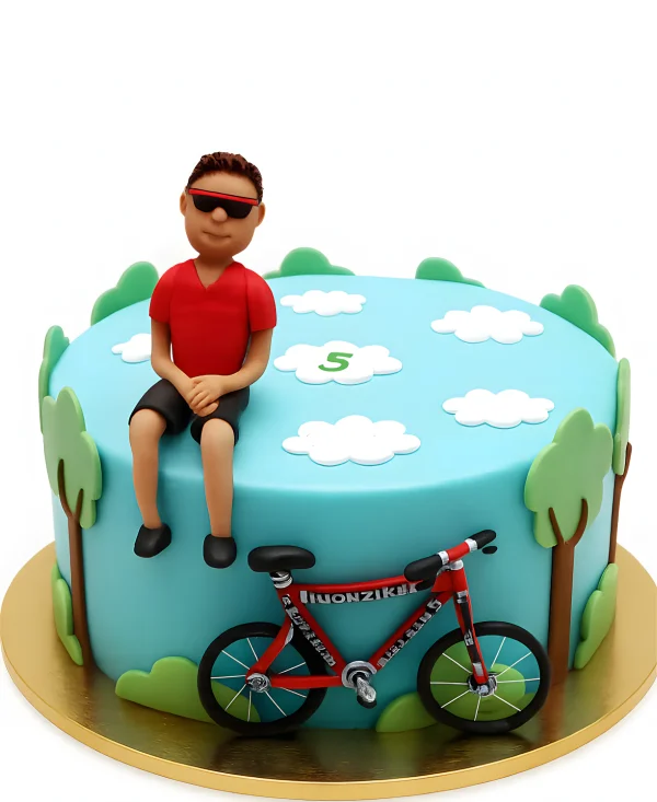 Торт с фигуркой велосипедиста Фото