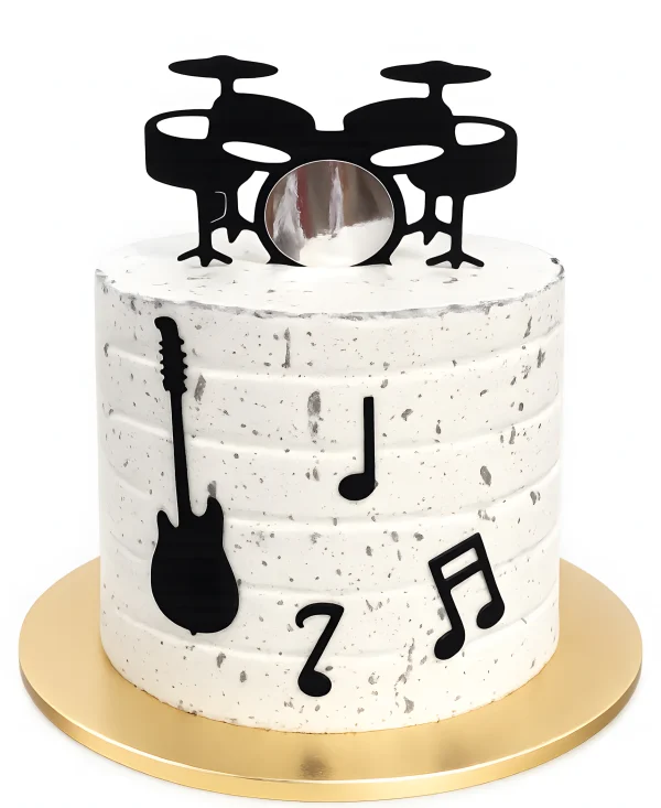 Торт с нотами, барабанами и гитарой для музыканта Фото